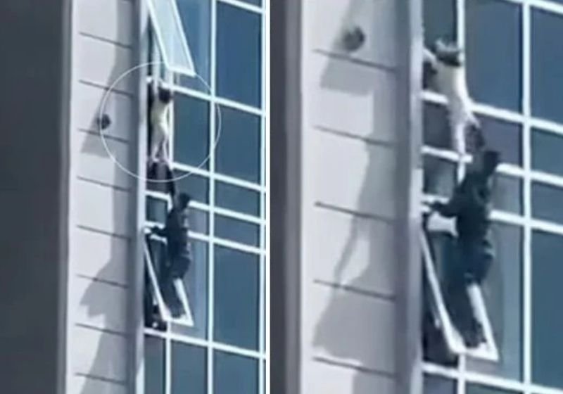 Homem escala prédio e salva criança pendurada em janela do 8º andar: VÍDEO